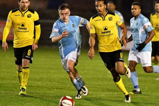 Lewis Wilson gets on the ball during AFC Rushden & Diamonds' 1-1 draw at Rugby Town. Picture by Martin Pulley