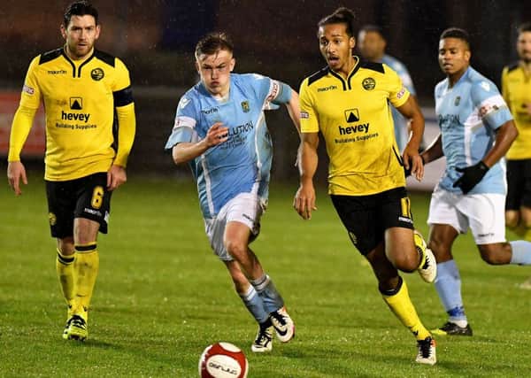 Lewis Wilson gets on the ball during AFC Rushden & Diamonds' 1-1 draw at Rugby Town. Picture by Martin Pulley