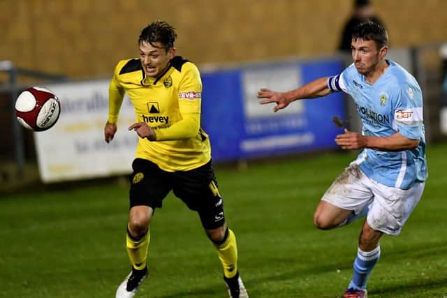 Jack Ashton suffered a knee injury during AFC Rushden & Diamonds' draw at Rugby Town. Picture by Martin Pulley