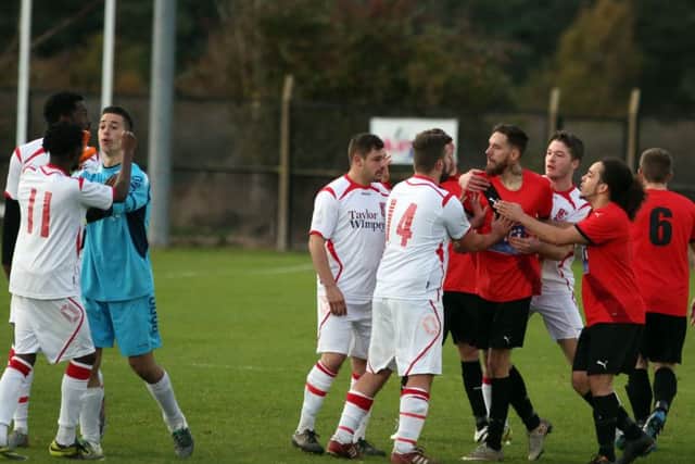 Frustrations boil over during Irchester United's big victory over Woodford United at Alfred Street last Saturday