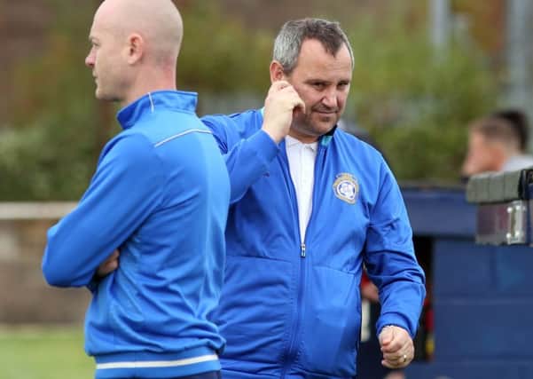 Chris Bradshaw believes the pressure is back on Desborough Town this weekend