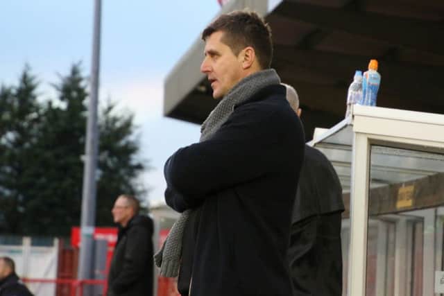 Marcus Law watches on during Kettering Town's FA Trophy defeat at Witton Albion. Pictures by Peter Short