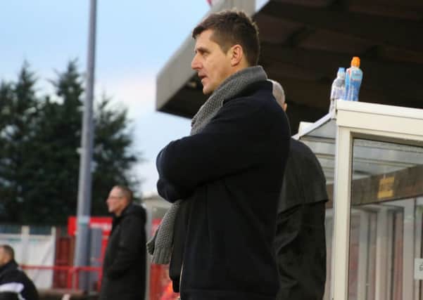 Marcus Law watches on during Kettering Town's FA Trophy defeat at Witton Albion. Pictures by Peter Short