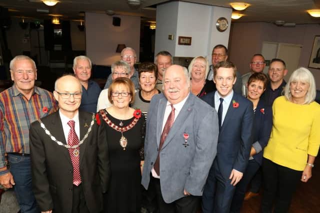 Mick surrounded by family and friends at Corby Conservative Club