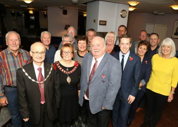Mick surrounded by family and friends at Corby Conservative Club