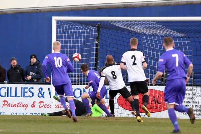 Alex Frost scores Ashton United's first goal in the 3-3 draw at Steel Park