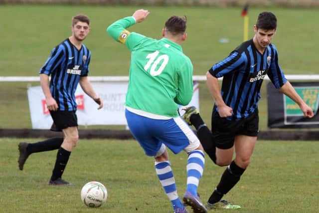 Action from Burton Park Wanderers' 2-1 home defeat to Lutterworth Athletic
