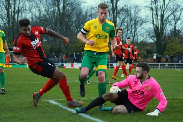 Rene Howe is denied by Liam Gotch during Kettering Town's 0-0 draw at Hitchin Town. Pictures by Peter Short