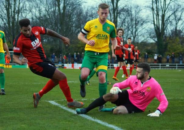 Rene Howe is denied by Liam Gotch during Kettering Town's 0-0 draw at Hitchin Town. Pictures by Peter Short