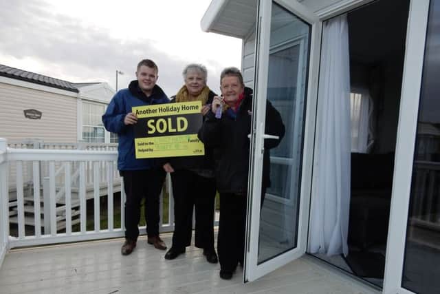Glennis Hooper and Marilyn Clapham outside the new holiday home