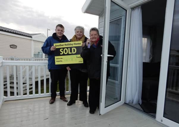 Glennis Hooper and Marilyn Clapham outside the new holiday home
