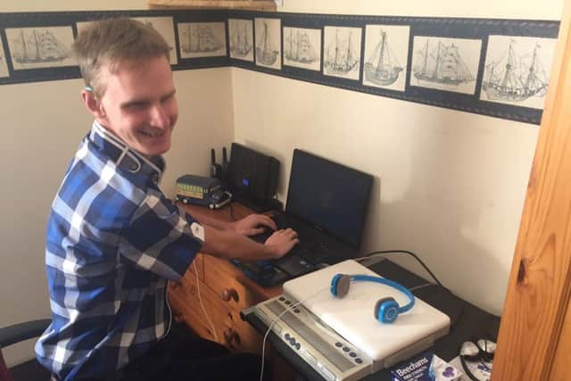 Lewis by his computer