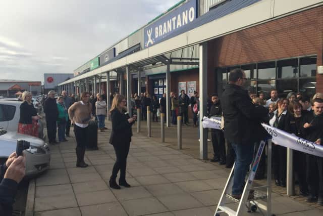 Shoppers queued for a short time to be among the first through the doors