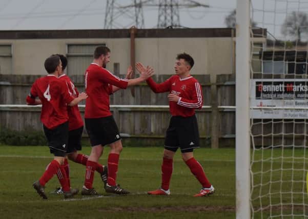 Rothwell Corinthians celebrate their goal during last weekend's 3-1 defeat at Cogenhoe United. Picture by Dave Ikin