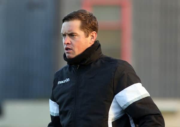 Gary Mills says the Corby Town players must step up to the plate in the battle at the bottom of the Evo-Stik Northern Premier League Premier Division. Picture by Alison Bagley