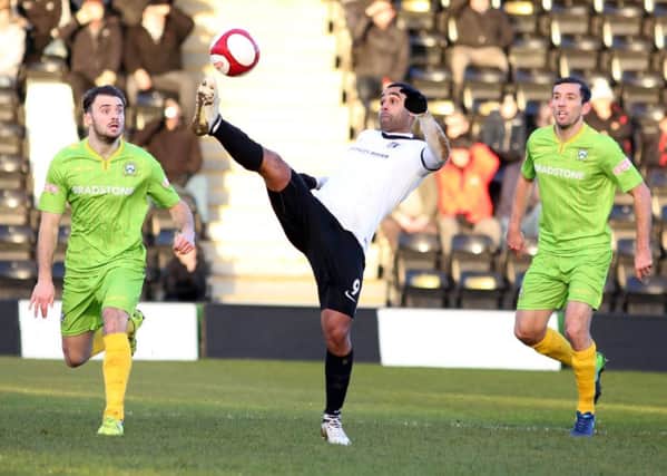 Stefan Moore in action during Corby Town's 2-0 defeat to Barwell at Steel Park. Pictures by Alison Bagley