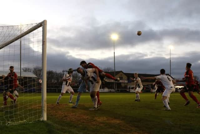 Goalmouth action from Kettering Town's 1-0 victory over Dorchester Town. Pictures by Peter Short