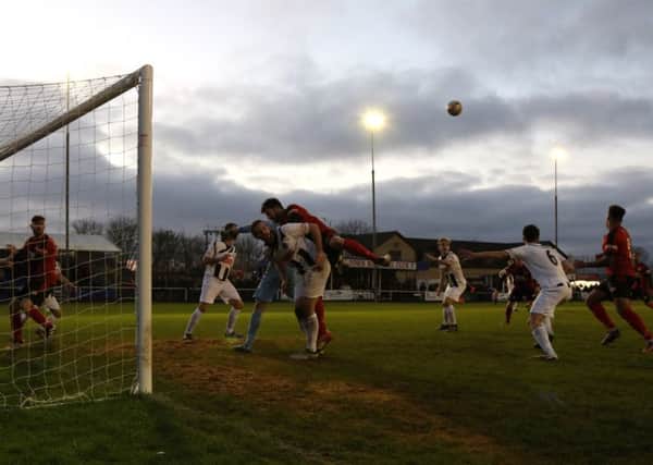 Goalmouth action from Kettering Town's 1-0 victory over Dorchester Town. Pictures by Peter Short
