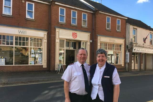 Majors Richard and Pauline Cook outside The Salvation Army on Bridge Street, Rothwell