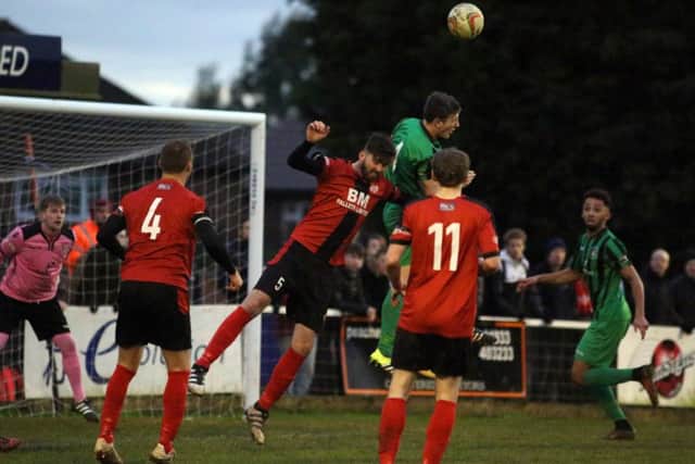 Action from Kettering's 2-0 win over Cinderford at Latimer Park