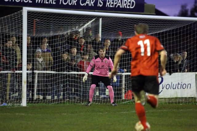 James Brighton heads for goal during the Poppies' success over Cinderford Town. Pictures by Alison Bagley