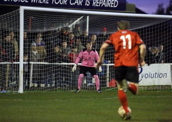James Brighton heads for goal during the Poppies' success over Cinderford Town. Pictures by Alison Bagley