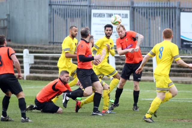 Action from Whitworth's 3-2 victory at Rushden & Higham United last weekend. Picture by Alison Bagley