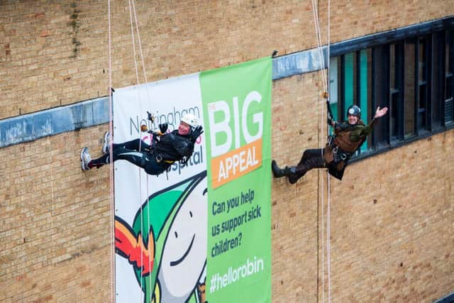 The appeal was launched by Nottingham University Hospitals Trust Chief Executive Peter Homa abseiling 100ft down the side of the hospital building, along with Nottinghams official Robin Hood.