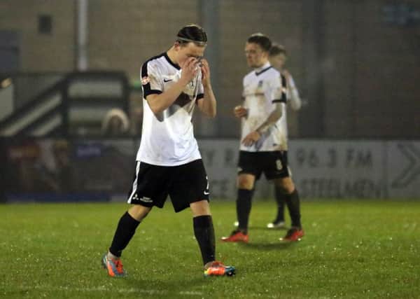 Jordon Crawford shows his frustration during Corby Town's 4-1 home defeat to Rushall Olympic at the weekend. Pictures by Alison Bagley