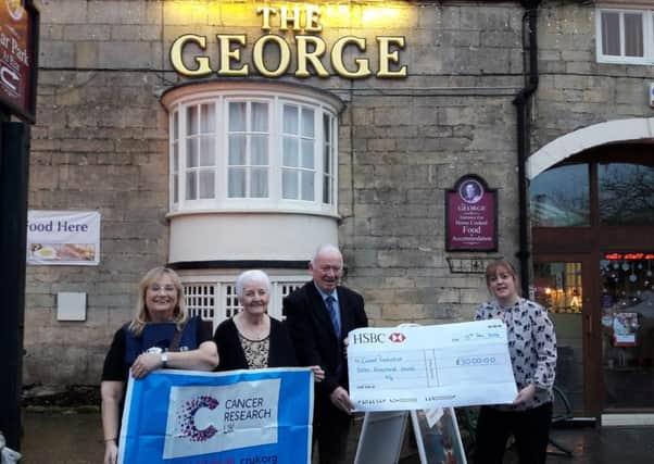 L-R: Lizzie Melvin, Jean and Noel Flynn and Louise Dempster with the cheque for Â£3,000.