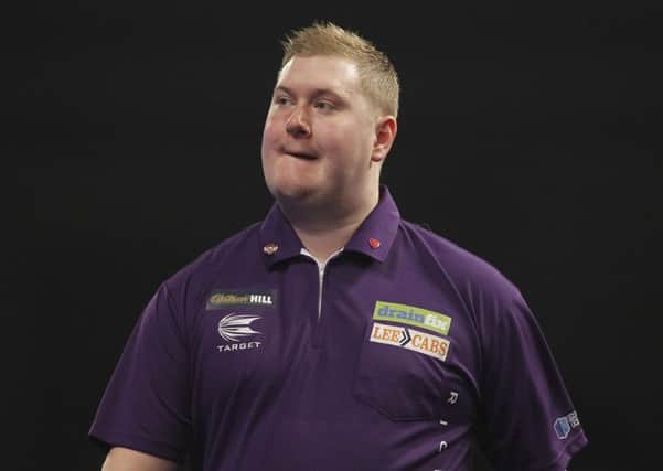 Kettering's Ricky Evans suffered a first-round defeat at the World Darts Championship