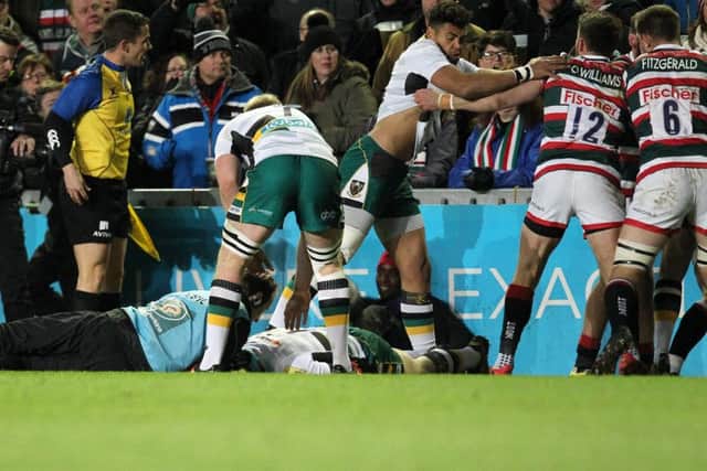The Saints medical staff attended to George North on the pitch at Welford Road (picture: Sharon Lucey)