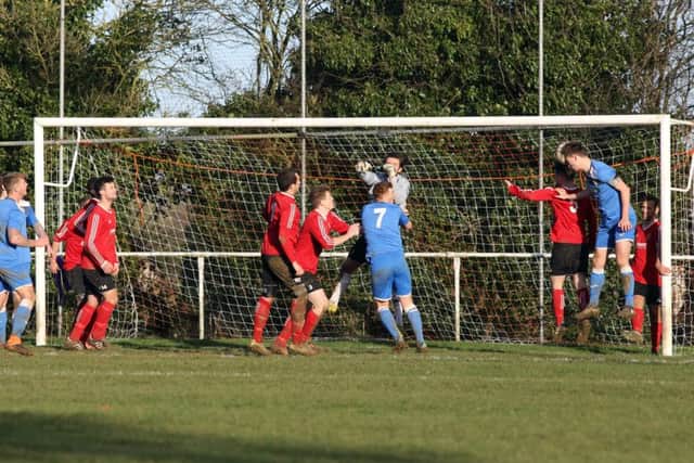 Aaron Davies heads Desborough into the lead during the 1-1 draw at Sergeants Lawn