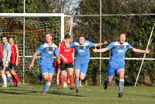 Aaron Davies celebrates after scoring for Desborough