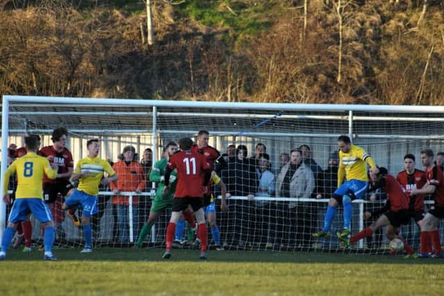 Action from Kettering Town's 1-1 draw with King's Lynn