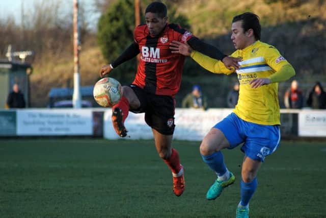 Wilson Carvalho gets on the ball for the Poppies