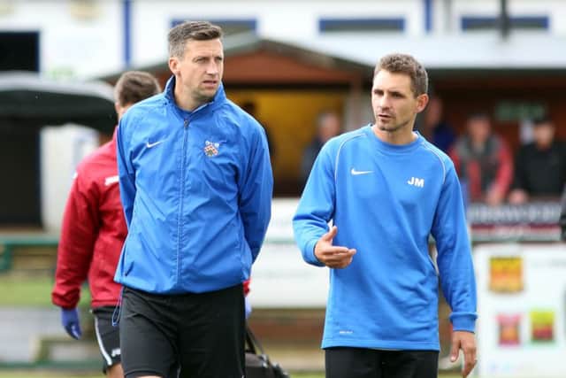 Jon Mitchell (right) has stepped down as Wellingborough Town boss with Stuart Goosey taking over
