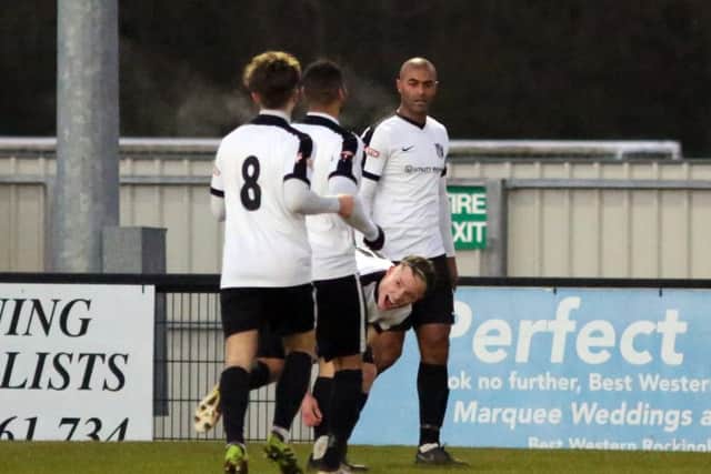 Phil Trainer celebrates with his team-mates after he opened the scoring at Steel Park