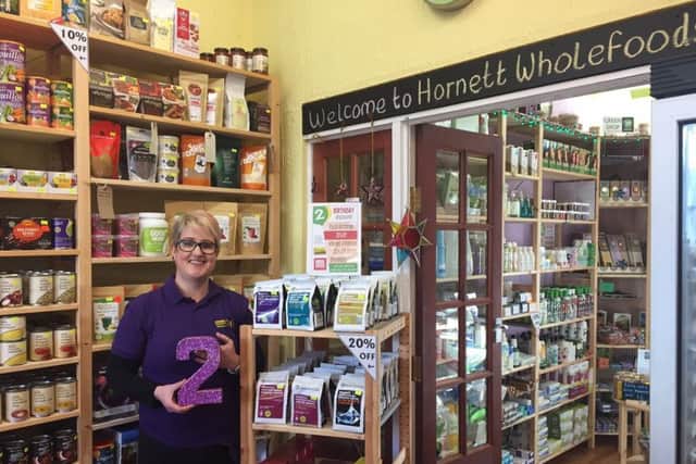 Emma Hornett in the shop in Midland Road, Wellingborough