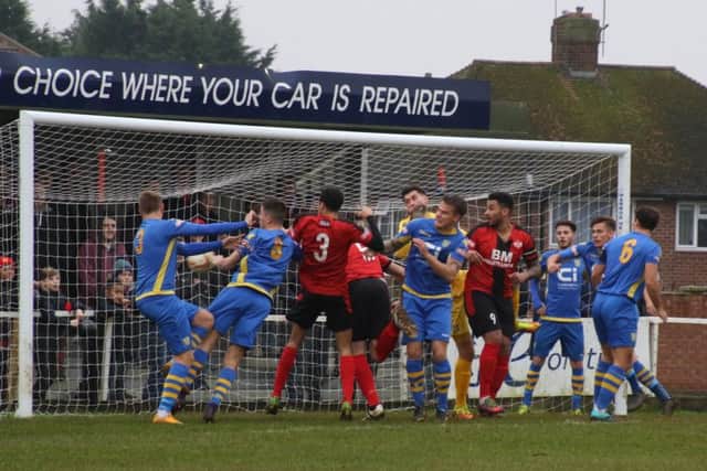 Goalmouth action at Latimer Park