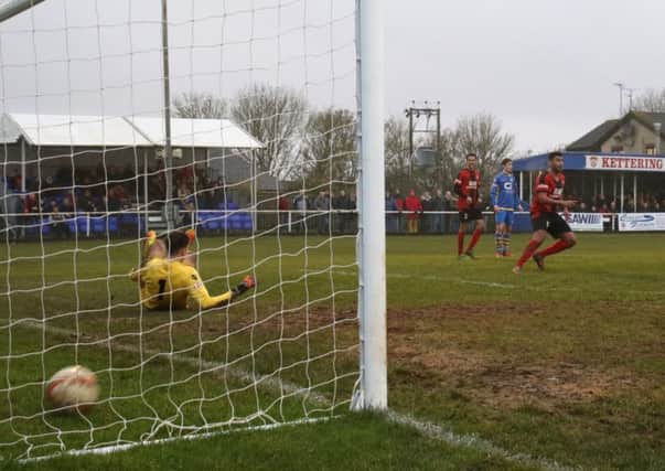 Rene Howe's shot finds the net for what proved to be Kettering Town's winner in their 2-1 success over Basingstoke Town. Pictures by Peter Short