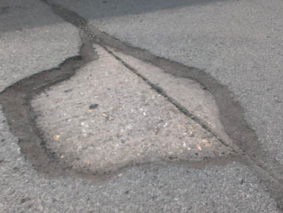 More than 2,000 people have sued the council for pothole damage over the past four years.