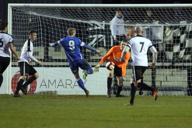 Aidan Grant made a late save to deny Warrington's Ciaran Kilheeney