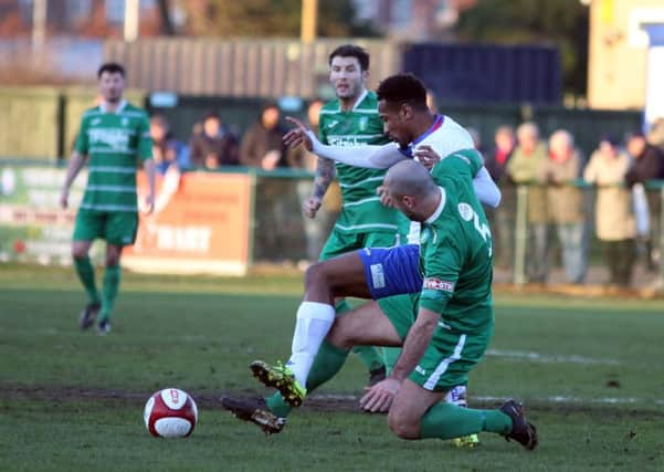 Match action as AFC Rushden & Diamonds' 19-match unbeaten run was ended by a 5-2 home defeat to Kidsgrove Athletic. Pictures by Alison Bagley