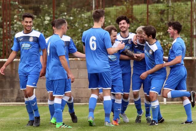 Desborough Town's players maintained their fine run with a 3-2 victory at Sleaford