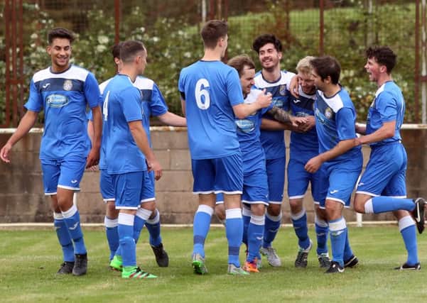 Desborough Town's players maintained their fine run with a 3-2 victory at Sleaford
