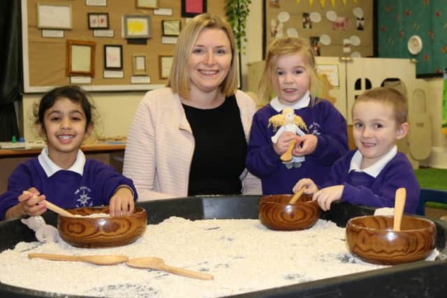 Jo Fallowell with current nursery pupils.