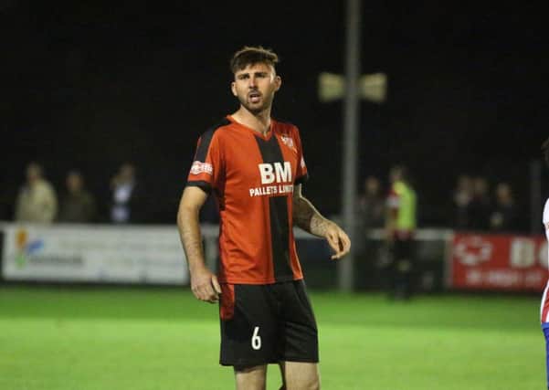 Poppies defender Paul Malone was rushed to hospital with gallstones last week