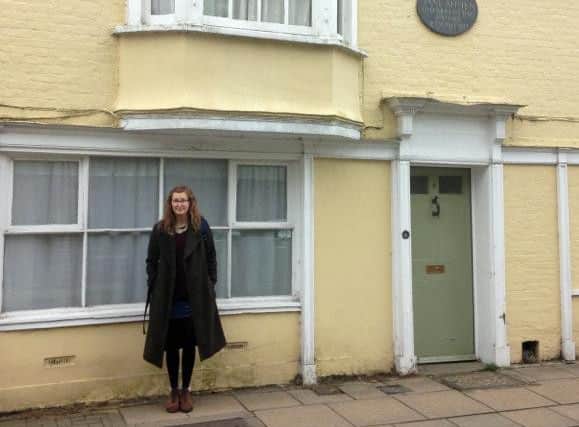 Travel writer Ella Walker outside Jane Austen's house.
