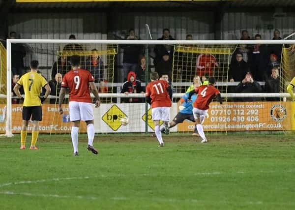 Nathan Hicks scores from the penalty spot but the goal proved to be in vain as Kettering Town's clash at Leamington was abandoned due to a power failure with the Poppies leading 1-0. Picture by Tim Nunan zSswWmPMvijnaUxtHaRB
